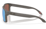 P&auml;ikeseprillid OAKLEY Holbrook XXL Woodgrain Prizm Deep Water Polarized